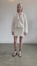 Load and play video in Gallery viewer, AVA MINI SKIRT | IVORY